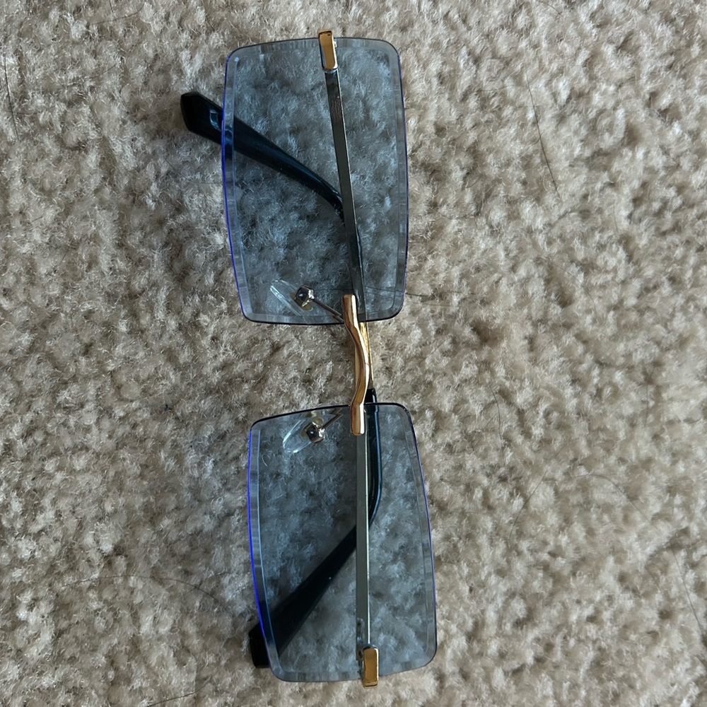 Gold and Black Rimless Sunglasses